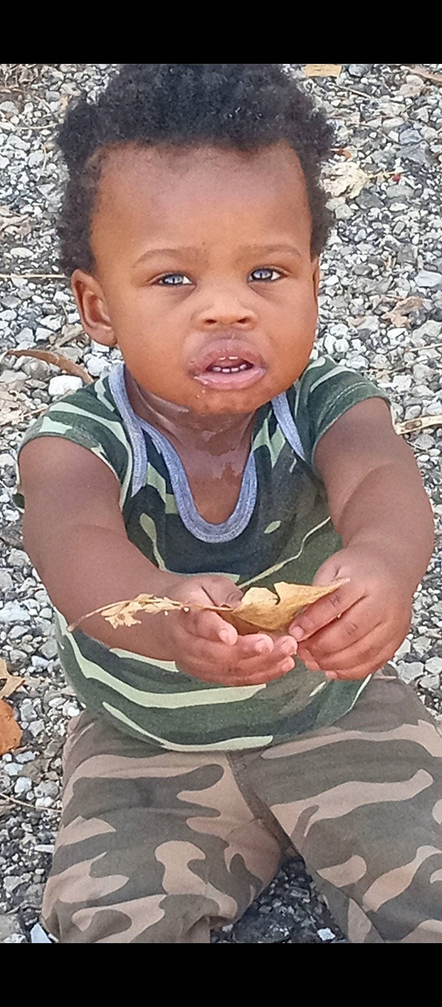 Braylon joined the competition — help win amazing prizes! adaptation, baby, beauty, cheek, child, chin, face, flash_photography, food, grass, happy, lip, mouth, organ, person, photograph, sitting, skin, smile, soil