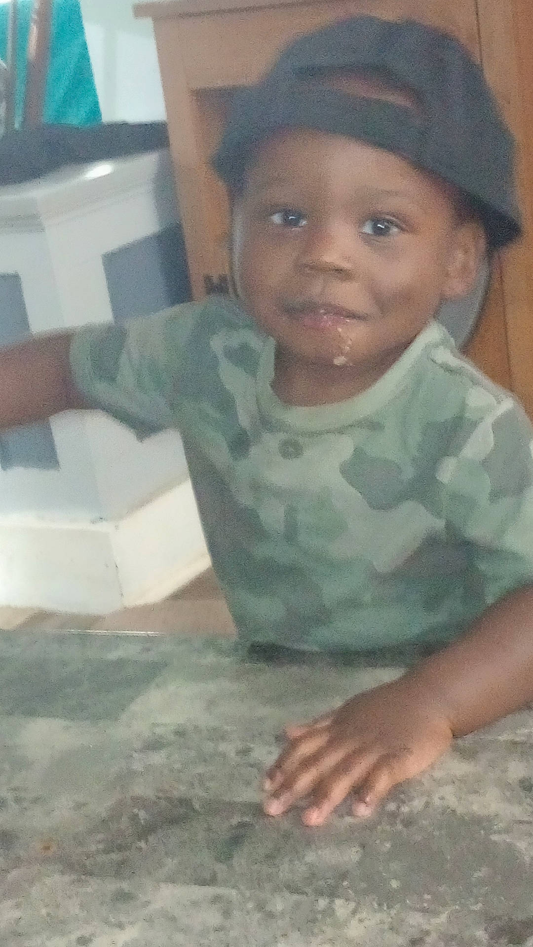 Braylon joined the competition — help win amazing prizes! cap, cheek, child, chin, eye, eyebrow, finger, flooring, forehead, fun, hand, happy, mouth, nose, person, room, sitting, skin, sleeve, thumb