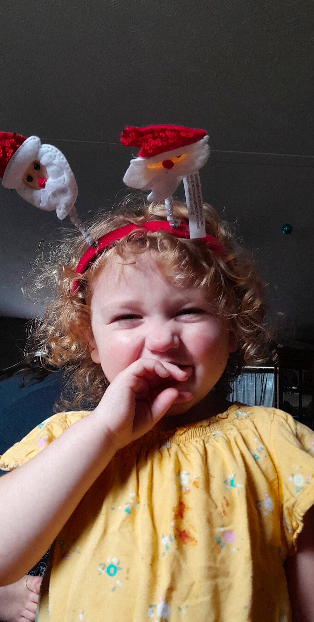 Nova Jane is registered to the contest to win money with this photo: baby, child, christmas, christmas_ornament, costume, costume_hat, event, fashion_accessory, fun, fur, happy, headband, headpiece, holiday, laugh, party_supply, person, pink, smile, toddler