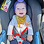 baby, child, car_seat, purple_headband, pacifier_clip, smiling, blue_eyes, white_shirt, yellow_bib, gray_cushion, safety_harness, toy, outdoor, daylight, infant, cute, happy, casual_clothing, toddler, seatbelt