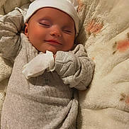Oakley joined the competition — help win amazing prizes! baby, sleeping, pajamas, hat, blanket, soft, cozy, cute, infant, peaceful, child, face, headwear, warm, resting, indoors, comfort, smile, newborn, portrait
