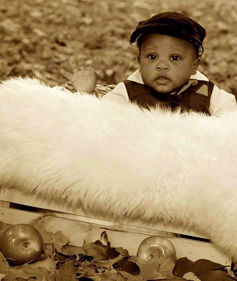 Lee joined the competition — help win amazing prizes! baby, black_and_white, child, fur, fur_clothing, headwear, monochrome, person, photography, smile, stock_photography, toddler