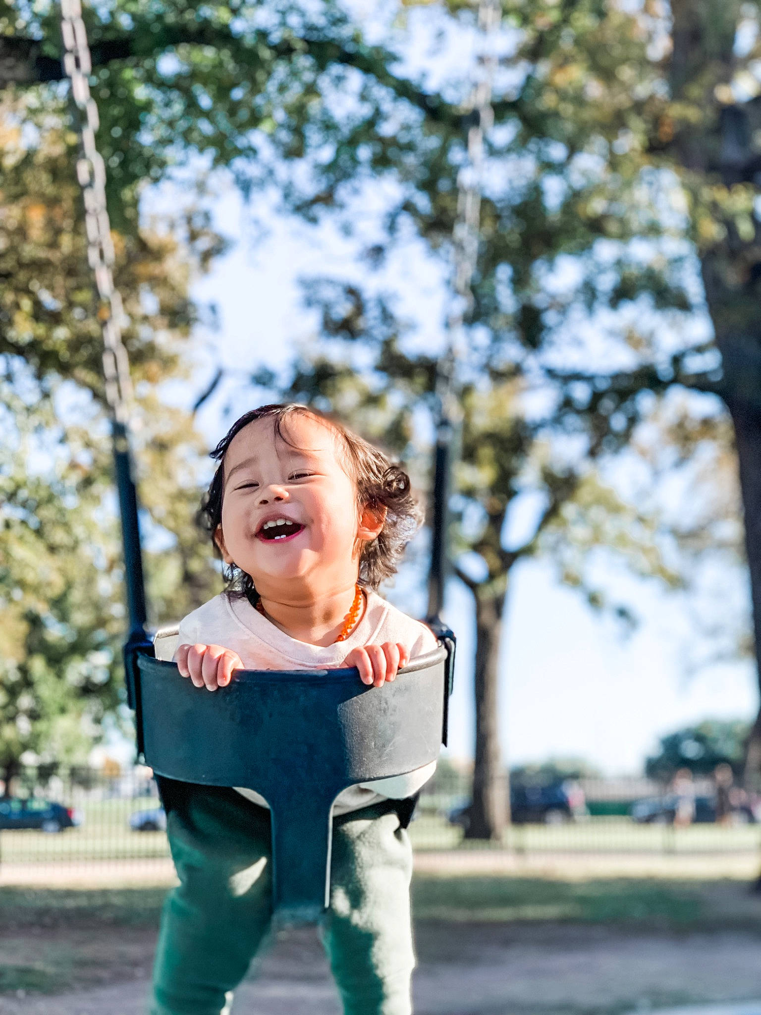 Jed joined the competition — help win amazing prizes! baby, blond, child, clothing, electric_blue, flash_photography, fun, grass, happy, joy, leisure, outdoor_play_equipment, people_in_nature, person, plant, playground, recreation, sitting, sky, swing