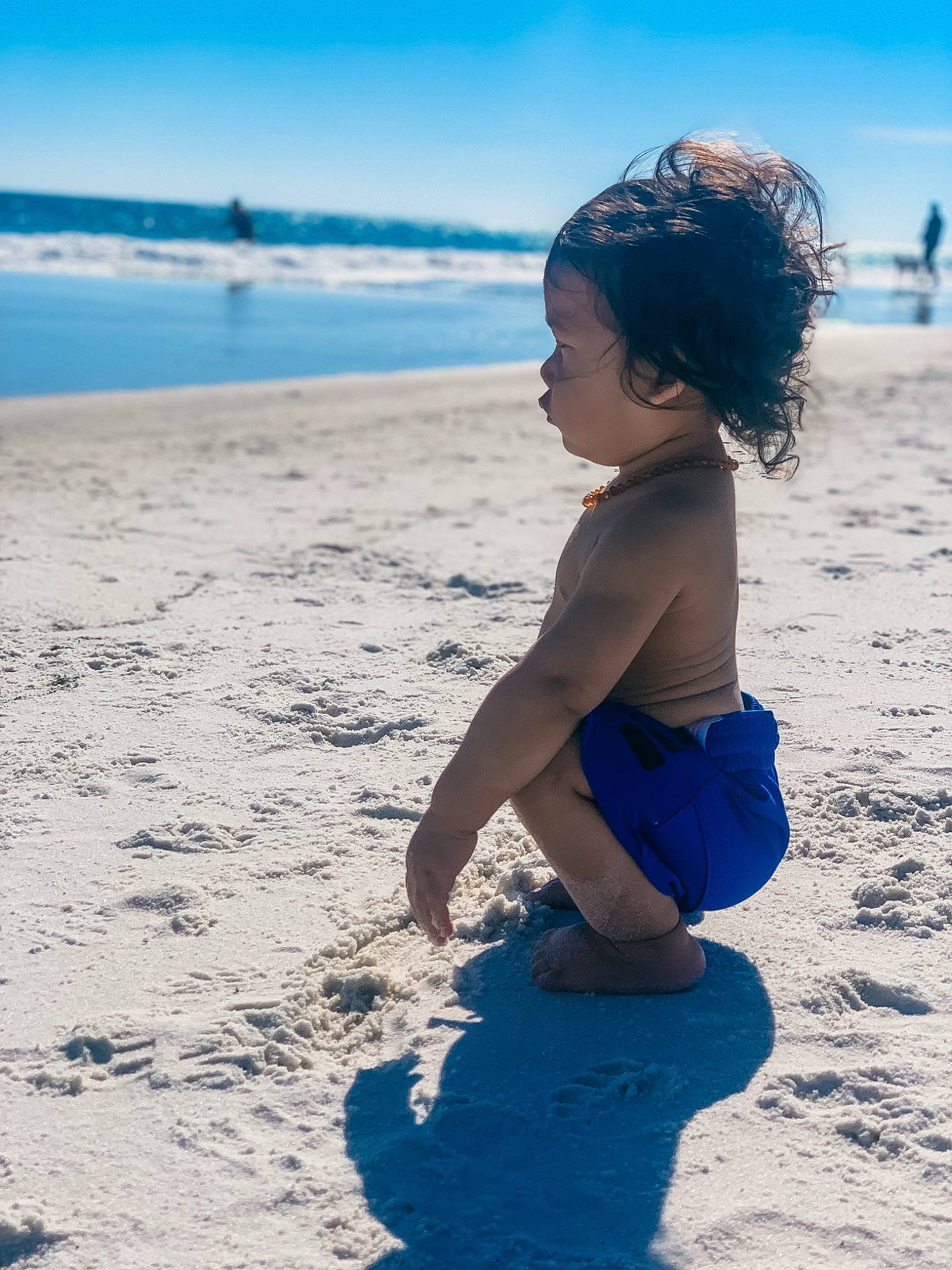 Jed is registered to the contest to win money with this photo: aqua, azure, beach, blue, cloud, coastal_and_oceanic_landforms, flash_photography, fun, happy, horizon, leisure, morning, people_in_nature, people_on_beach, person, sand, sky, sunlight, toddler, water