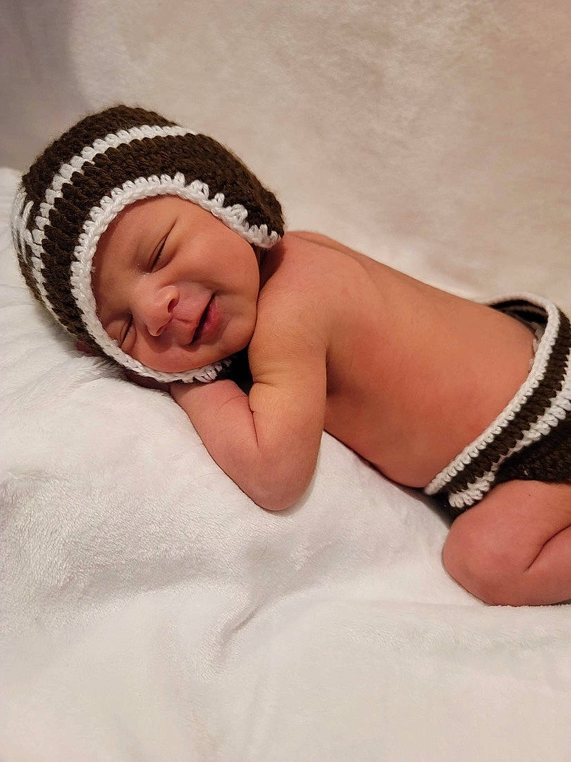 Jameson joined the competition — help win amazing prizes! arm, baby, baby_sleeping, bed, bedding, bedtime, child, comfort, fashion_accessory, flash_photography, foot, happy, headwear, human_leg, jewellery, knee, linens, nap, person, portrait_photography