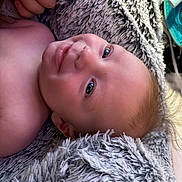 Jordan joined the competition — help win amazing prizes! baby, child, smiling, face, hand, nails, painted_nails, blanket, fluffy, texture, skin, portrait, lying_down, happy, cute, infant, closeup, blue_eyes, soft, cozy