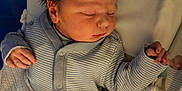 Alexander joined the competition — help win amazing prizes! newborn, baby, sleeping, blanket, knitted, striped_clothing, infant, cute, peaceful, resting, soft_light, portrait, indoors, small_hand, hair, face, cozy, wrapped, child, sleep