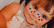 Haisley is registered to the contest to win money with this photo: toddler, child, face, heart_filter, blue_eyes, brown_hair, sleeveless_shirt, indoor, couch, leather, closeup, portrait, cute, baby, skin, expression, person, young_child, comfort, casual