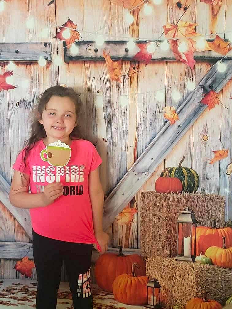 Kylie joined the competition — help win amazing prizes! calabaza, couch, cucurbita, fruit, gourd, happy, joy, local_food, natural_foods, orange, people, person, plant, pumpkin, room, squash, t_shirt, vegetable, visual_arts, whole_food