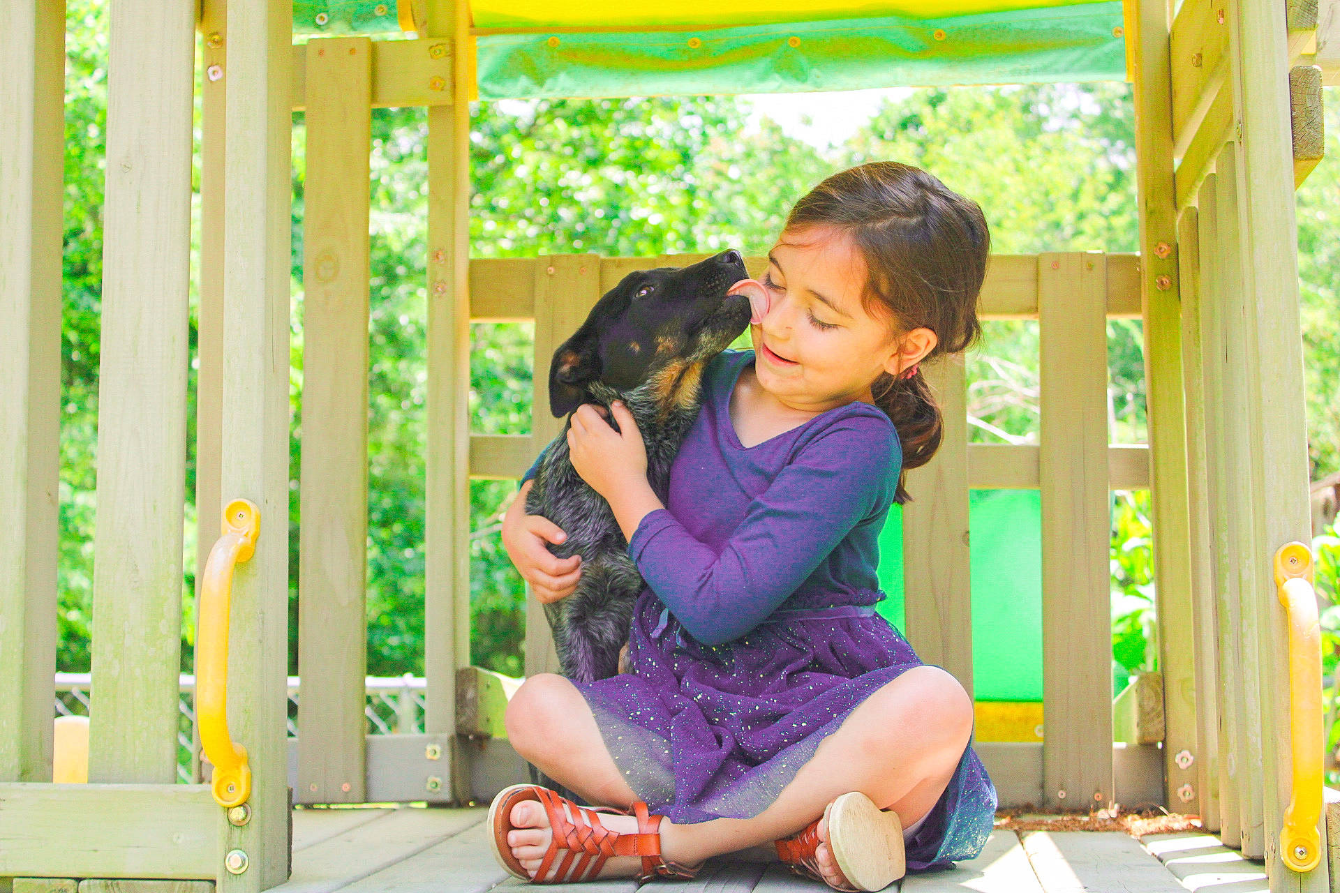 Abrielle joined the competition — help win amazing prizes! child, city, companion_dog, fun, grass, happy, joy, leisure, love, outdoor_play_equipment, person, play, recreation, sandal, sitting, smile, snapshot, summer, thigh, toddler