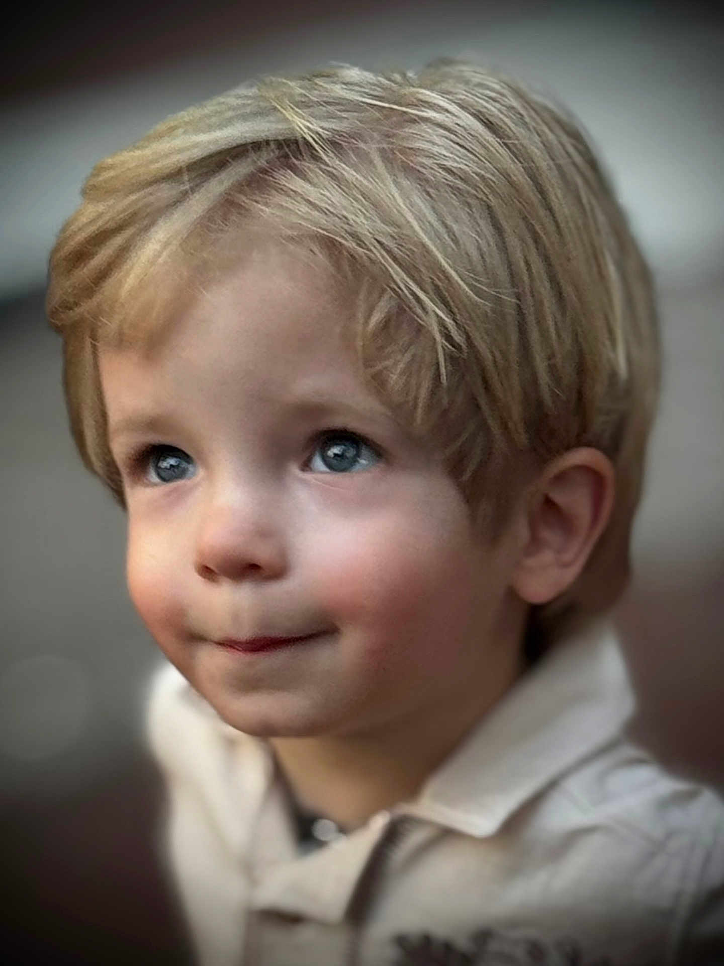 Ryker joined the competition — help win amazing prizes! child, blonde_hair, blue_eyes, portrait, close_up, innocent, curious, soft_background, face, young, person, cute, smile, looking_up, casual_clothing, light_skin, short_hair, indoors, head_and_shoulders, expression