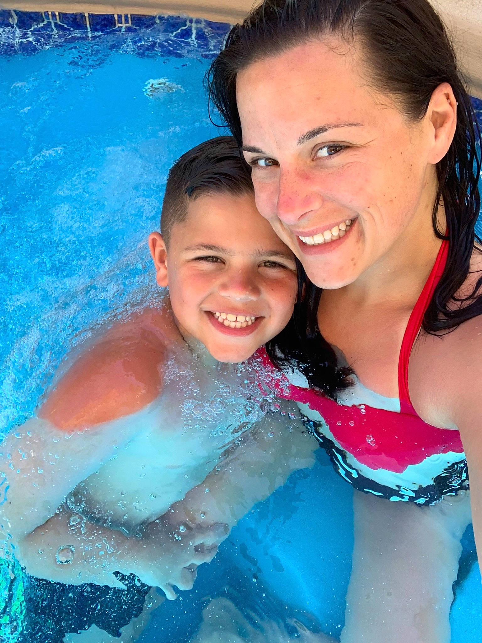 Tyler joined the competition — help win amazing prizes! facial_expression, fun, happy, joy, leisure, person, recreation, smile, swimming_pool, vacation, water, water_park