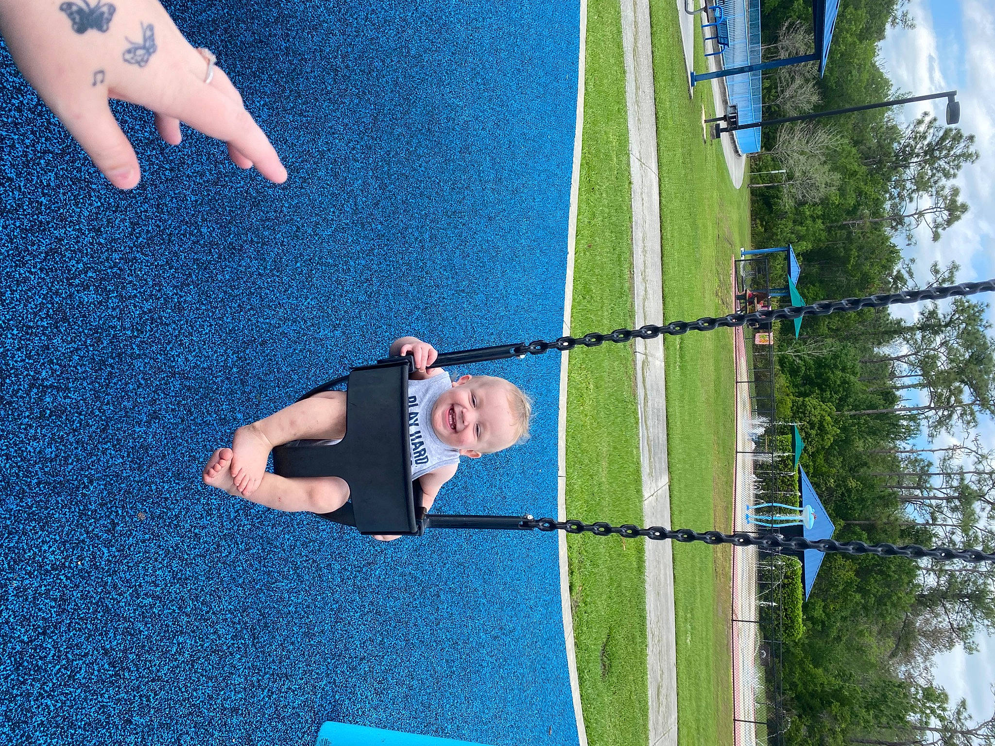 Bryson is registered to the contest to win money with this photo: azure, blue, daytime, elbow, electric_blue, fun, grass, green, human_body, human_leg, joy, knee, leisure, line, person, plant, recreation, sky, sports_uniform, t_shirt