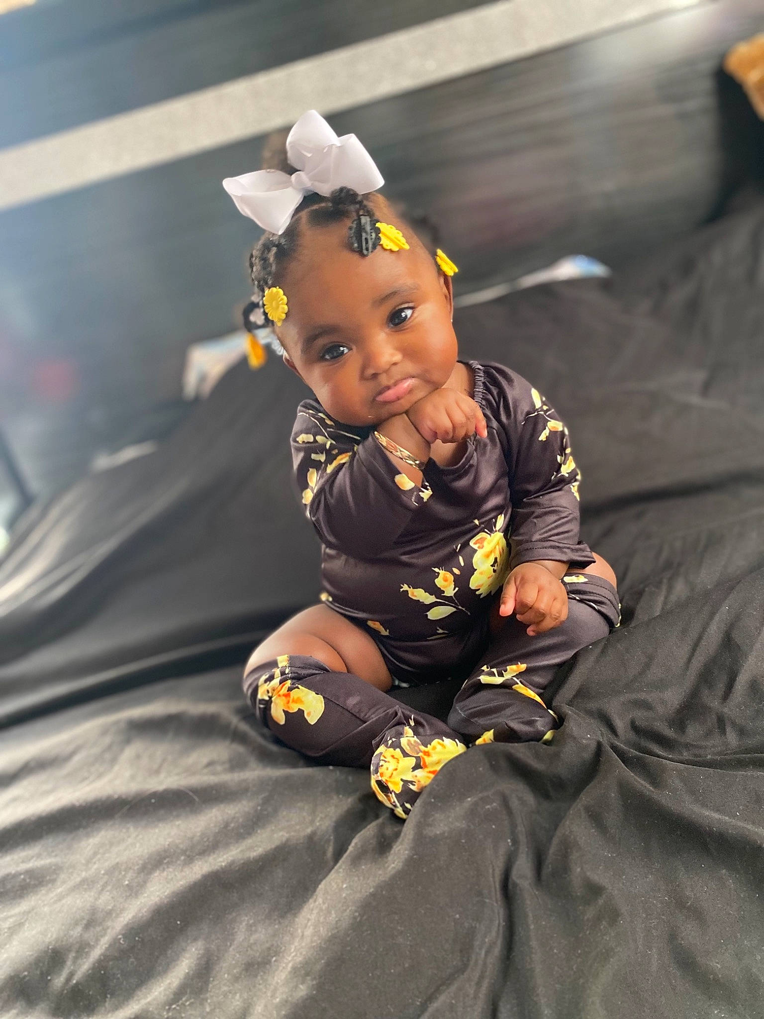 Anyla is registered to the contest to win money with this photo: baby, child, competition_event, costume, eye, fashion_accessory, flooring, fun, happy, hat, leisure, person, personal_protective_equipment, play, recreation, room, sitting, smile, toddler, toy