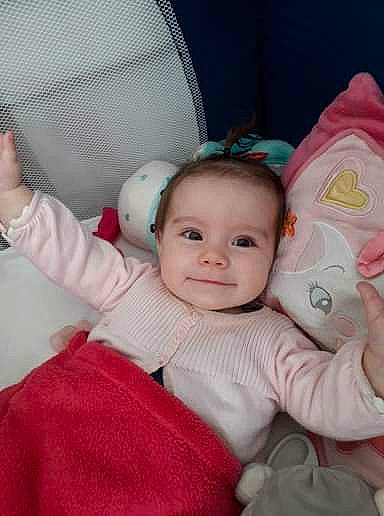 Maëlys participe au concours pour gagner de l'argent avec cette photo : baby_products, bedtime, boy, cheek, child, day, ear, eye, face, head, infant, iris, mouth, nose, person, pink, product, skin, smile, textile