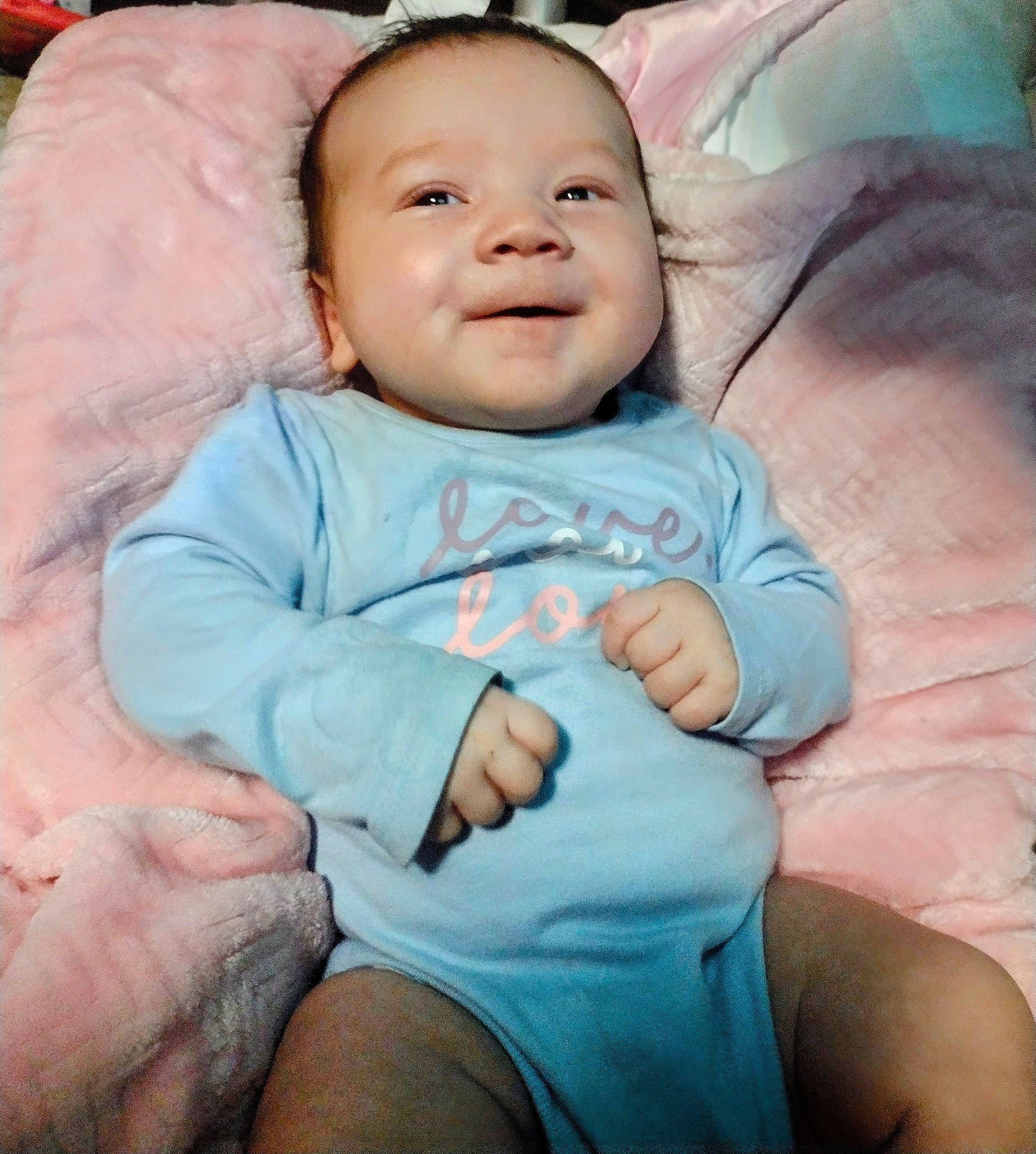 Lilibet is registered to the contest to win money with this photo: baby, baby_toddler_clothing, cheek, chin, comfort, eye, eyebrow, face, finger, gesture, happy, head, mouth, muscle, nose, person, pink, skin, sleeve, smile