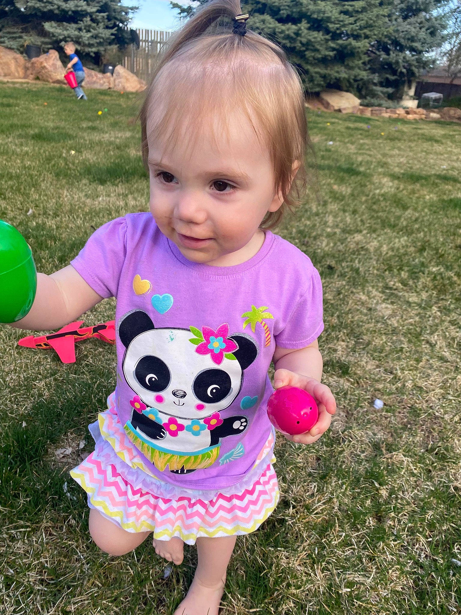 Sammie joined the competition — help win amazing prizes! baby_toddler_clothing, botany, child, fun, garden, grass, grassland, green, happy, magenta, people_in_nature, person, pink, plant, sky, sleeve, summer, t_shirt, toddler, toy