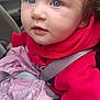 child, baby, car_seat, seatbelt, blue_eyes, blonde_hair, hoodie, red_clothing, blanket, car_interior, infant, young_child, closeup, cute, portrait, hand, safety, car_window, curious, wearing