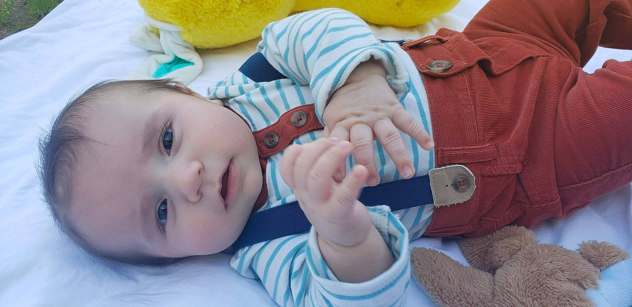 Allen is registered to the contest to win money with this photo: arm, baby, baby_toddler_clothing, comfort, eyelash, finger, gesture, hand, happy, joint, mouth, nail, neck, nose, person, product, skin, textile, thumb, toddler