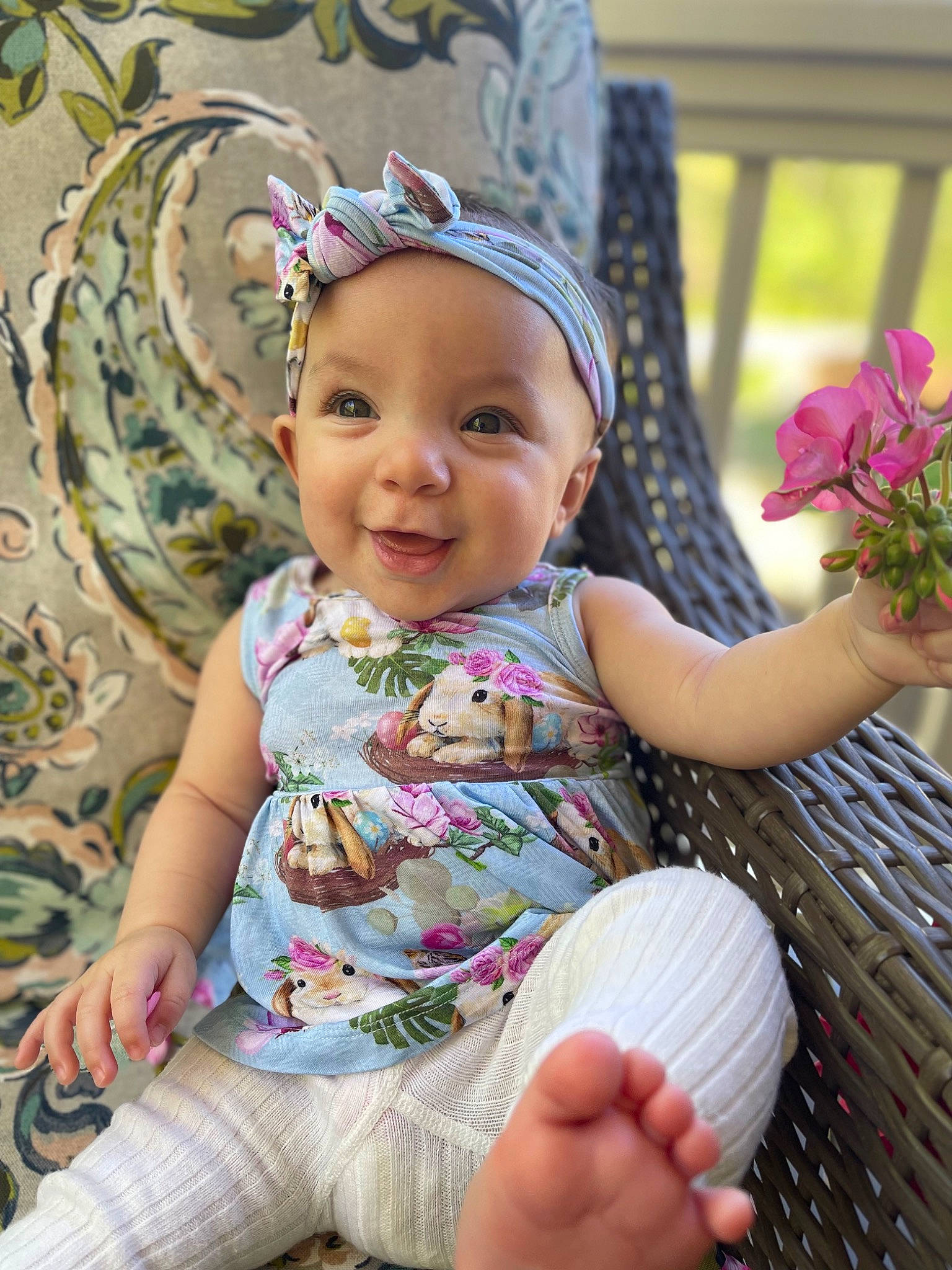 Adley joined the competition — help win amazing prizes! baby, baby_toddler_clothing, child, facial_expression, finger, flower, fun, grass, hand, happy, head, headgear, headwear, people_in_nature, person, pink, plant, purple, skin, smile