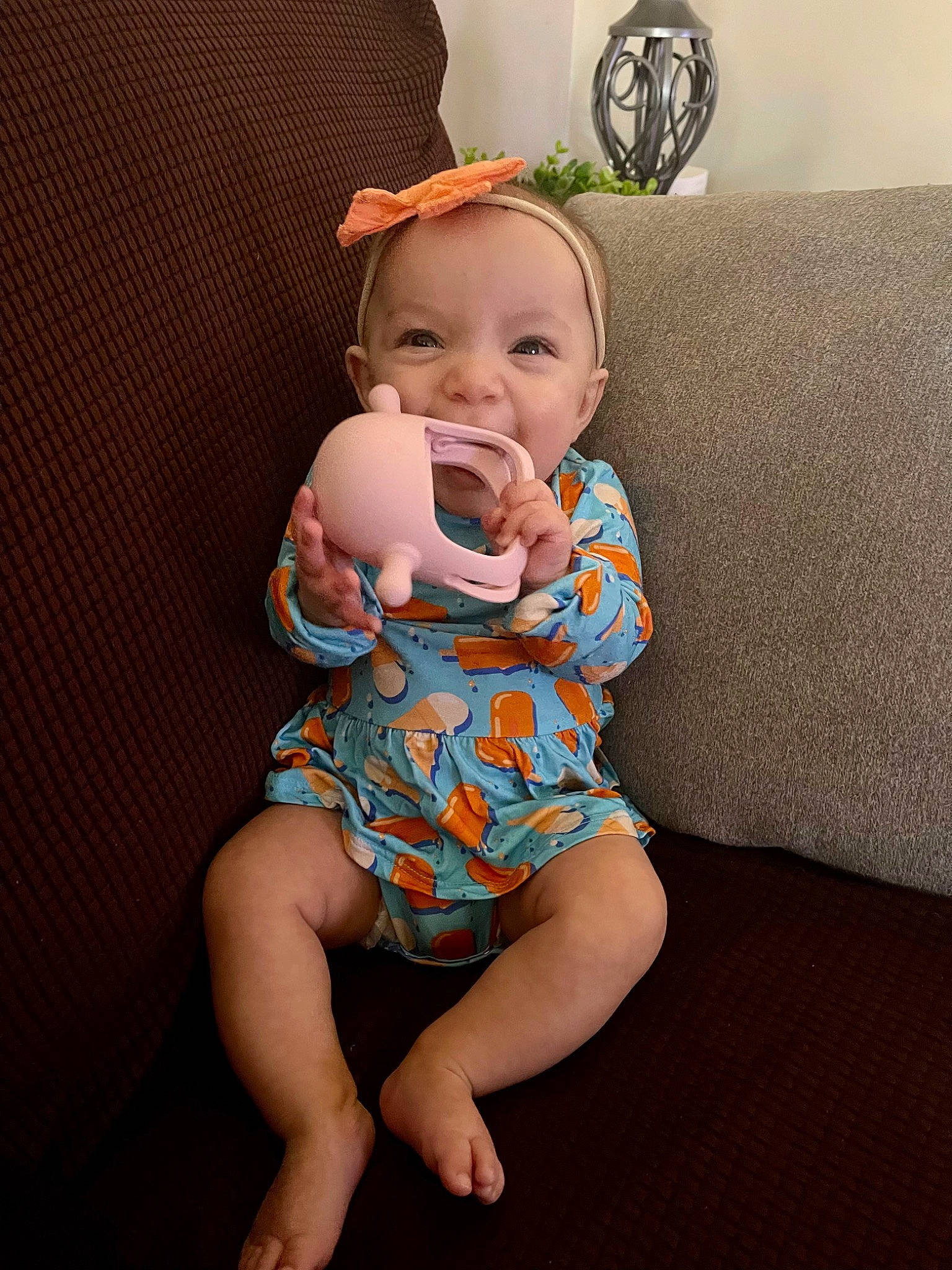 Adley is registered to the contest to win money with this photo: baby, baby_toddler_clothing, cheek, comfort, eye, face, flash_photography, hair, happy, head, human_body, iris, knee, neck, person, shoulder, skin, sleeve, stomach, thigh