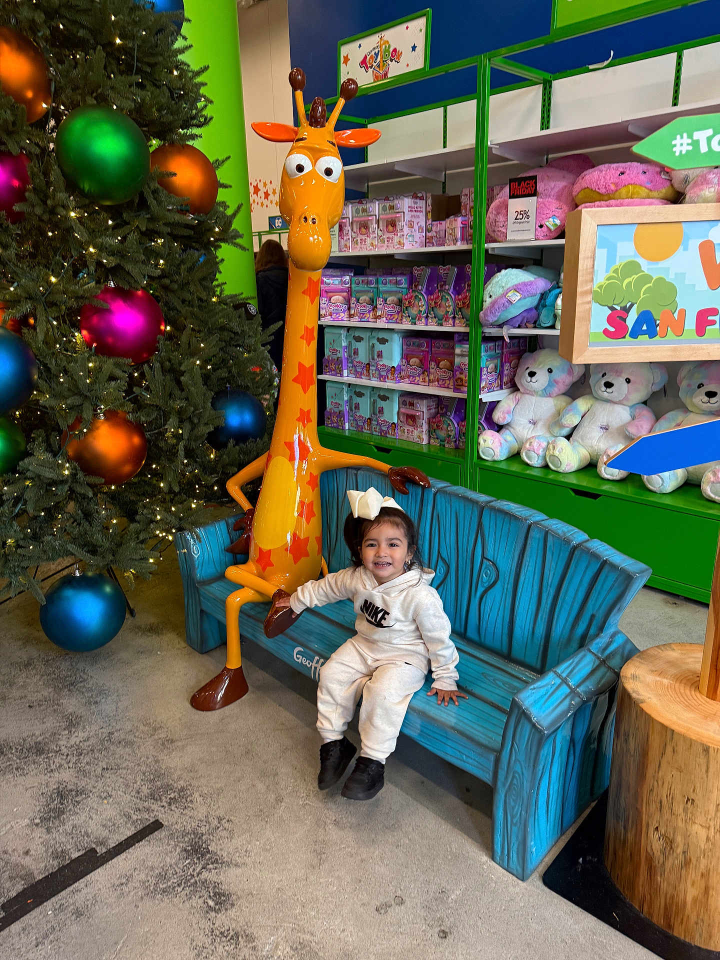Kailani joined the competition — help win amazing prizes! boy, child, clothing, couch, face, footwear, furniture, head, indoors, interiordesign, male, pants, person, photography, plant, portrait, shoe, sitting, toy, tree