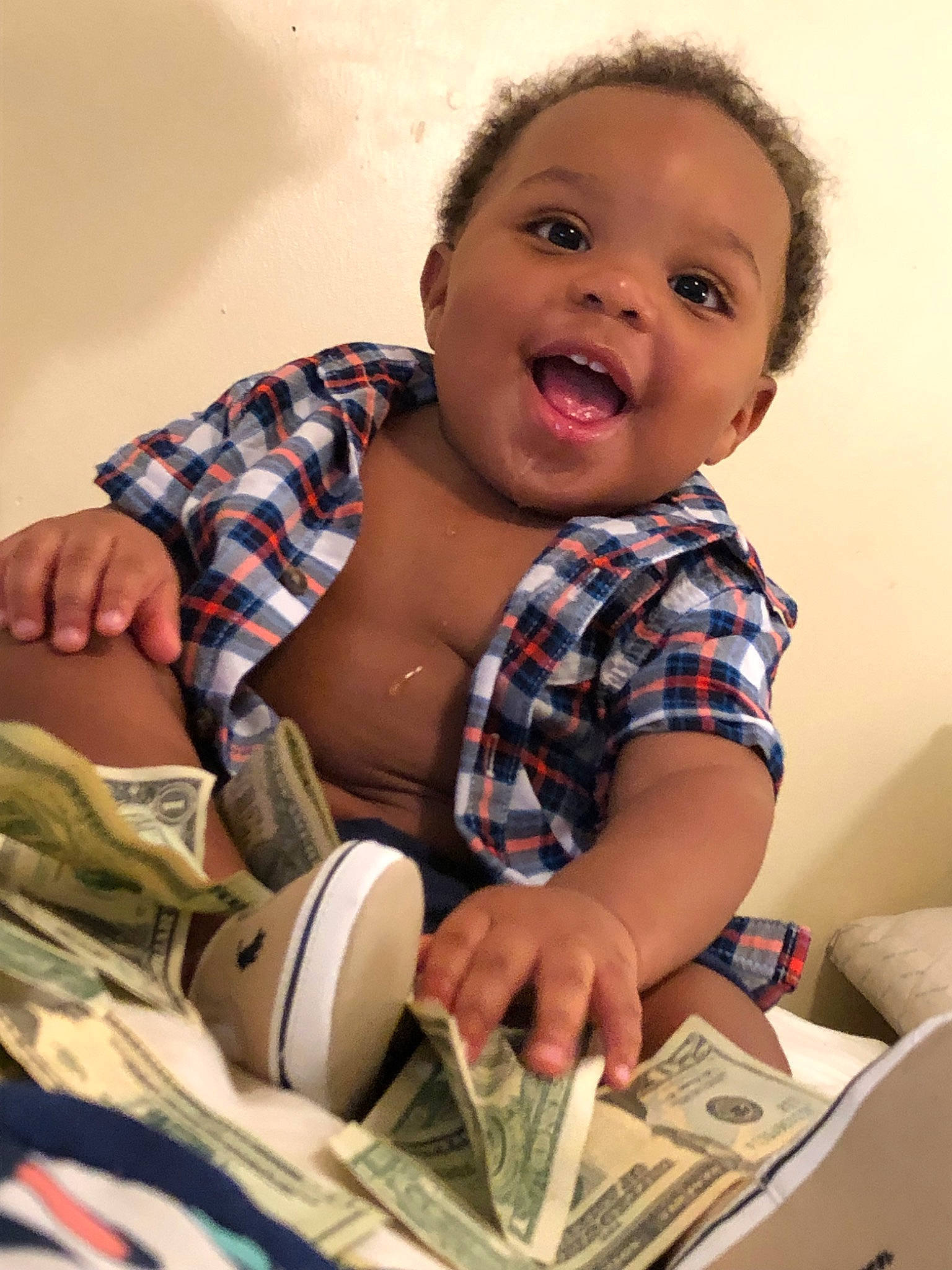 Jaylyn is registered to the contest to win money with this photo: baby, cheek, child, person, reading, sitting, smile, toddler