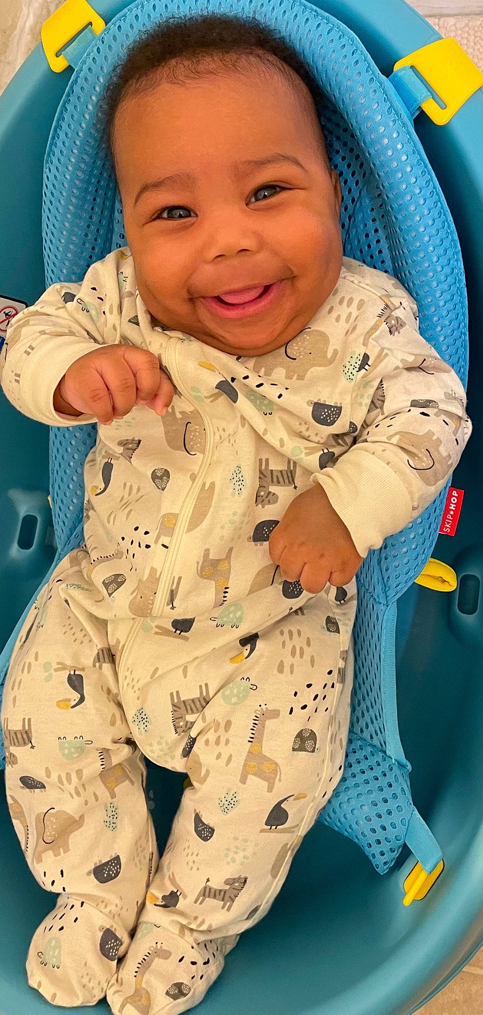 Denzel joined the competition — help win amazing prizes! arm, baby, baby_toddler_clothing, blue, cheek, clothing, eye, face, facial_expression, hand, head, human_body, joy, mouth, nose, organ, outerwear, person, product, skin