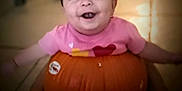 Mary joined the competition — help win amazing prizes! baby, babylaughing, bodypart, clothing, face, finger, food, happy, head, laughing, person, photography, plant, portrait, produce, pumpkin, smile, squash, t_shirt, vegetable