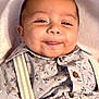 Isaiah joined the competition — help win amazing prizes! baby, smiling, face, infant, shirt, suspenders, blanket, portrait, cute, child, closeup, happy, young, clothing, person, baby_face, cheeks, tongue, button, fabric