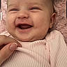 Avery joined the competition — help win amazing prizes! baby, smiling, infant, pink_clothing, blanket, face, portrait, video_call, hand, happy, cute, child, people, indoor, technology, phone_screen, communication, closeup, soft_texture, person
