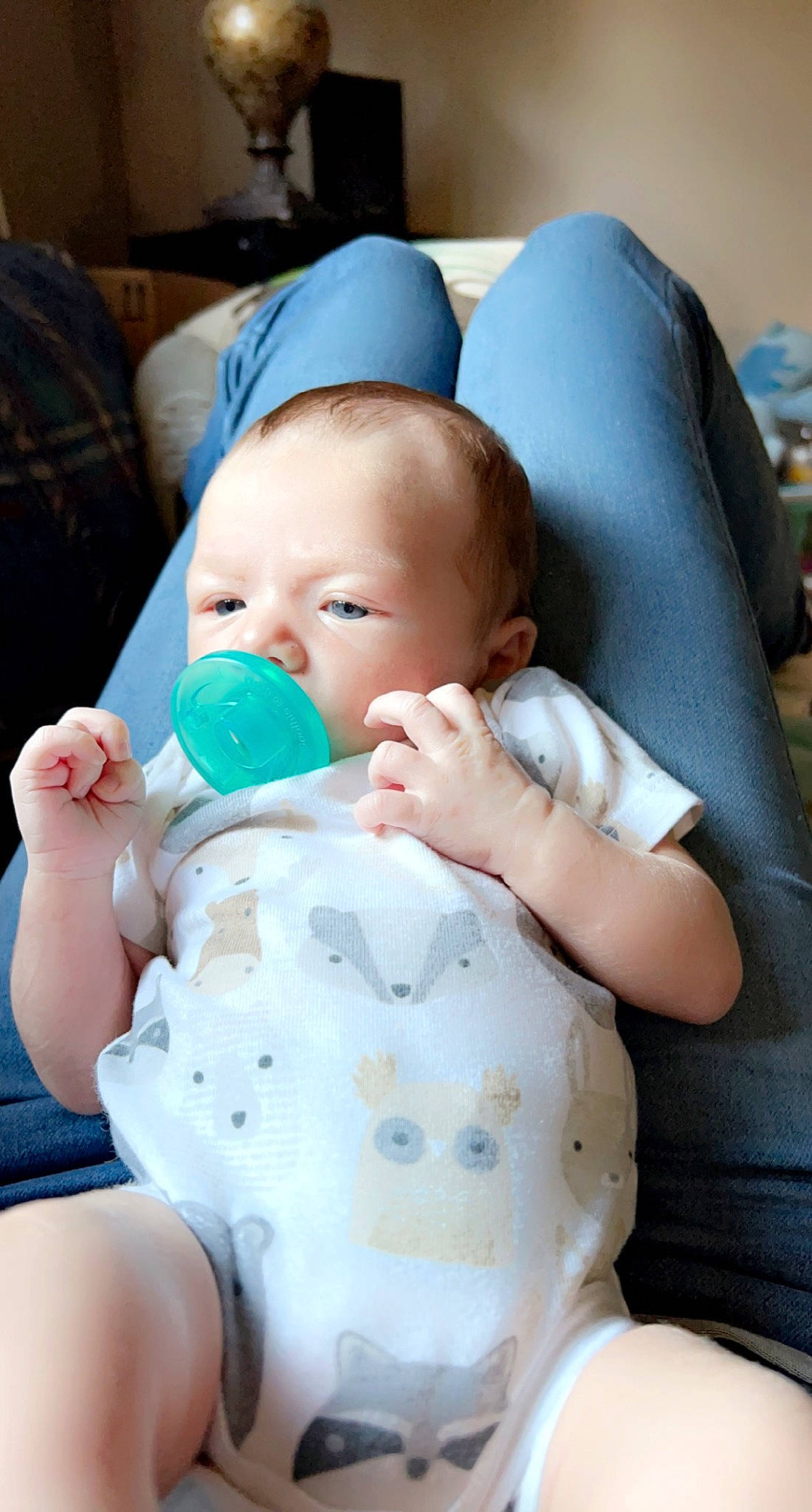Christopher joined the competition — help win amazing prizes! baby, baby_products, baby_sleeping, baby_toddler_clothing, cheek, child, comfort, drinkware, facial_expression, finger, gesture, hand, mouth, nail, person, plastic_bottle, sitting, skin, textile, thumb