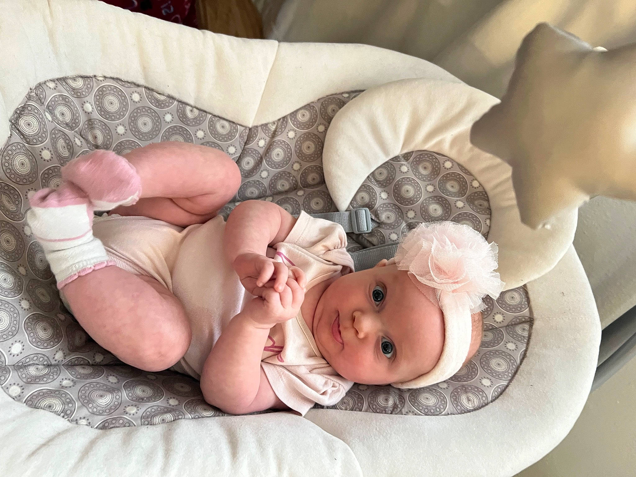 Cecilia is registered to the contest to win money with this photo: baby, baby_products, baby_sleeping, baby_toddler_clothing, child, comfort, dishware, eye, fashion_accessory, hair_accessory, headgear, headpiece, headwear, linens, pattern, peach, person, petal, rose, serveware