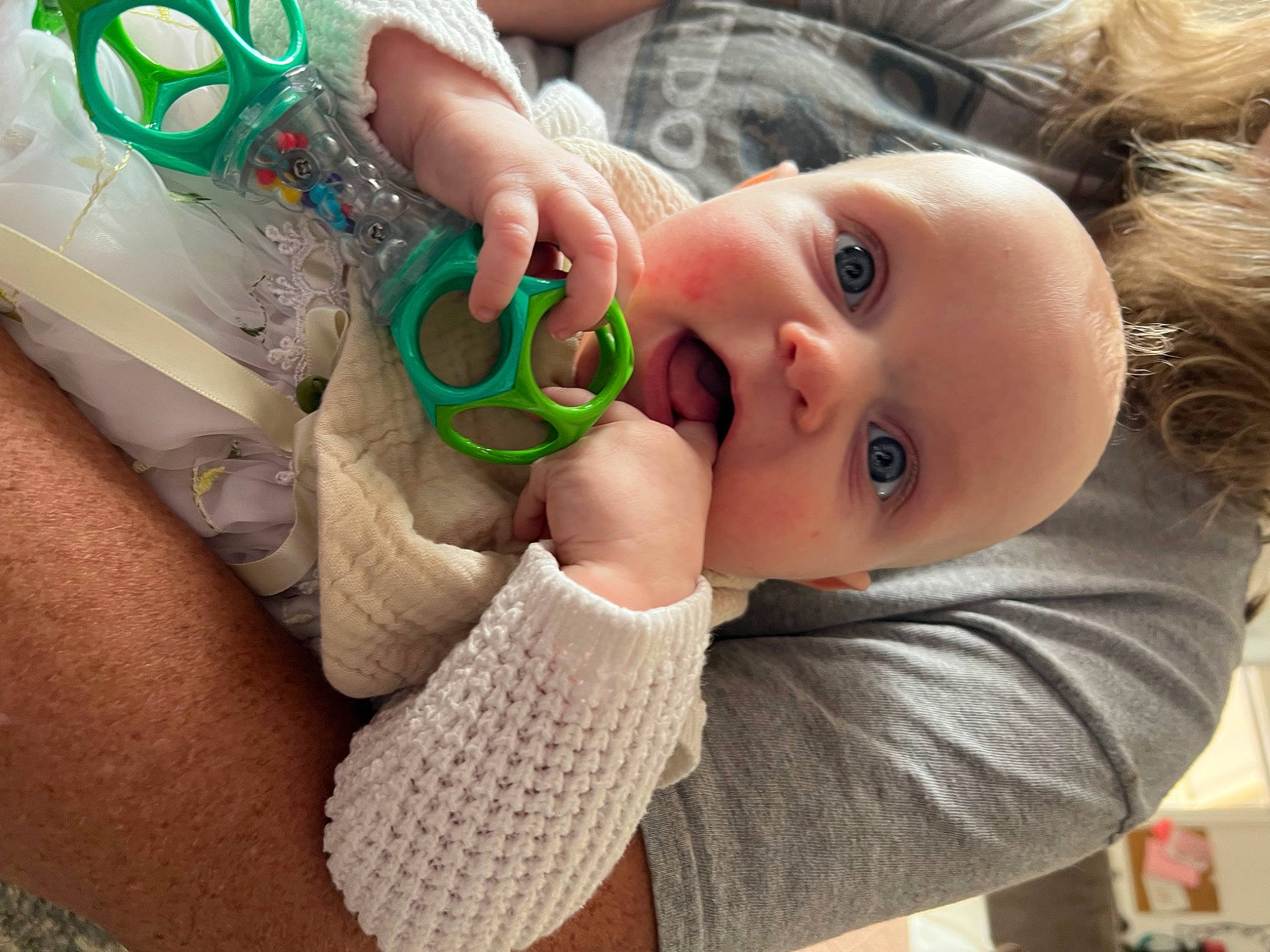 Cecilia is registered to the contest to win money with this photo: baby, baby_toddler_clothing, cheek, child, ear, eyelash, eyewear, finger, foot, fun, gesture, grass, hand, happy, nail, nose, person, skin, surprise, thumb