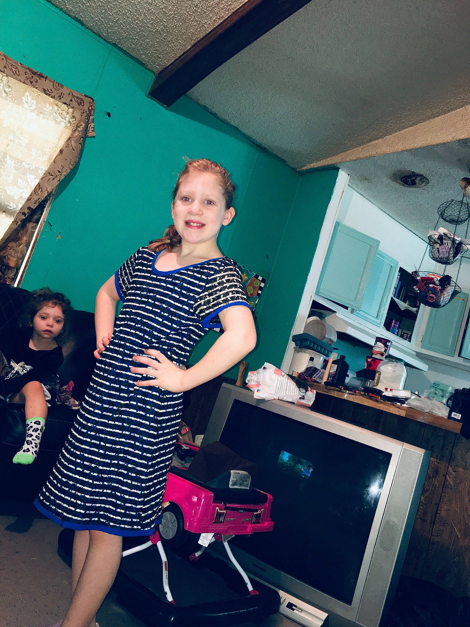 Haley is registered to the contest to win money with this photo: design, dress, fashion, fashion_design, fun, joy, pattern, person, photography, polka_dot, room, shoe, shoulder, standing