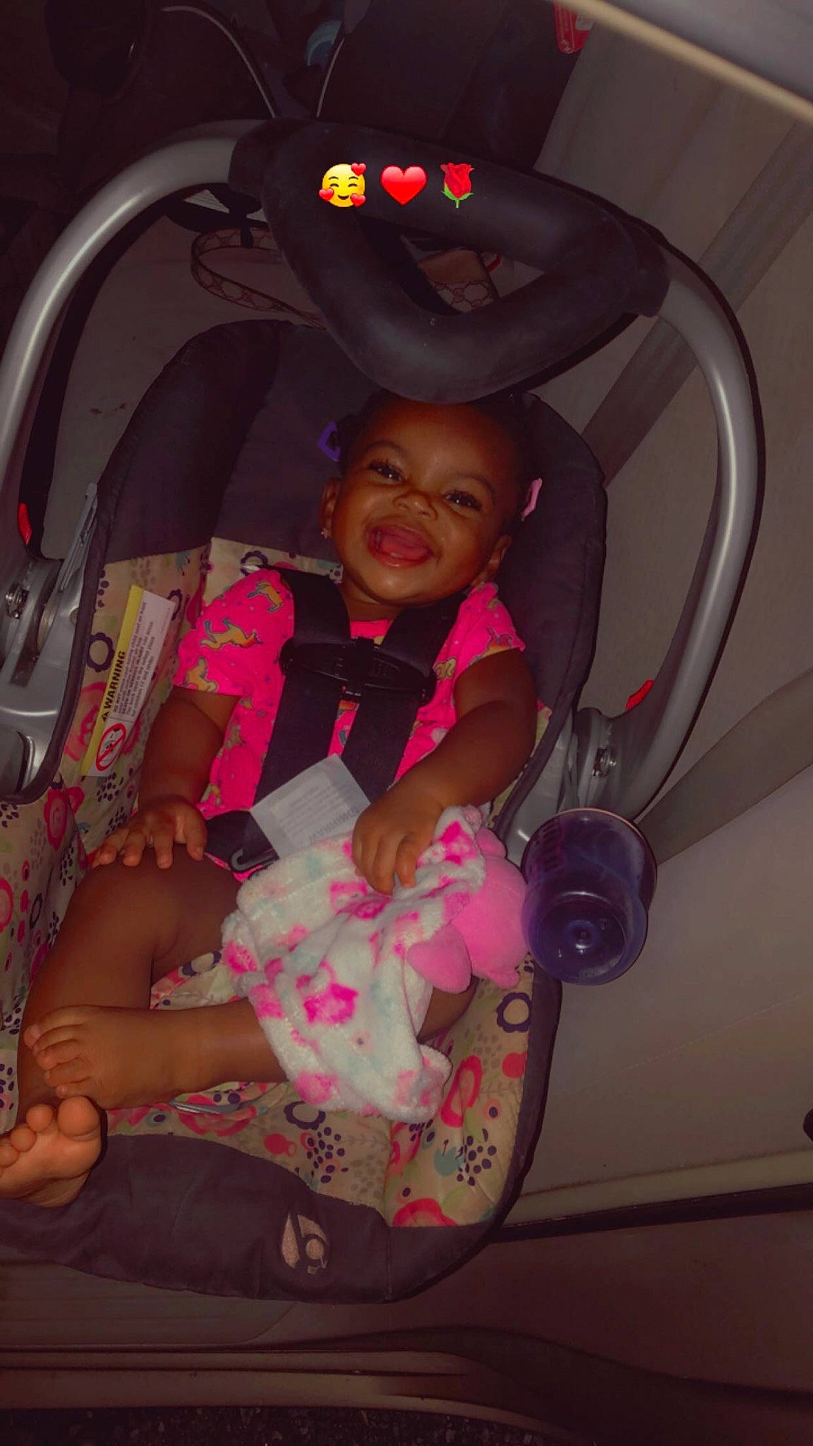 Kiara is registered to the contest to win money with this photo: auto_part, automotive_lighting, baby, baby_products, baby_toddler_clothing, car_seat, child, comfort, eye, fun, happy, joy, magenta, organ, pattern, person, pink, room, smile, thumb