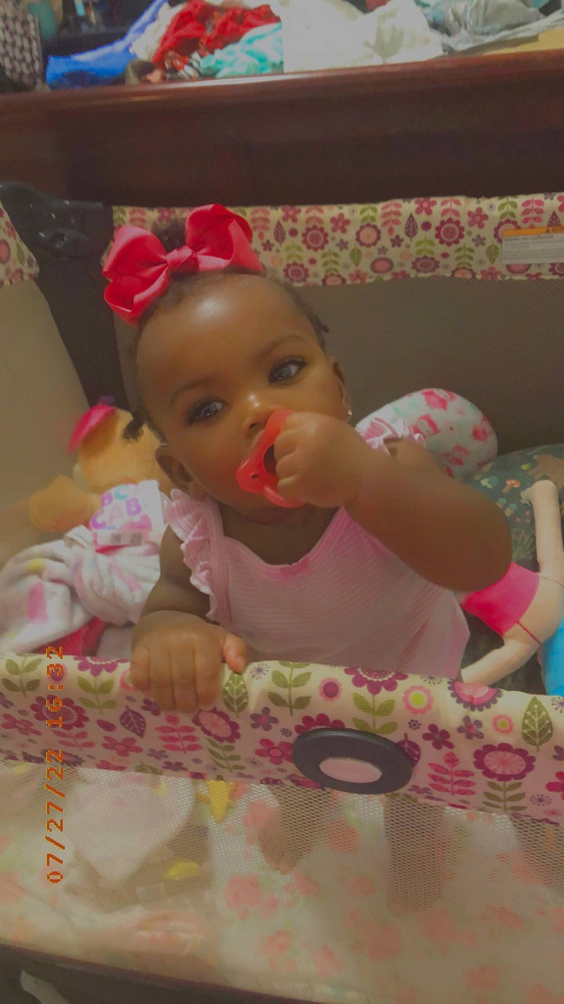 Kiara is registered to the contest to win money with this photo: baby, baking, cake_decorating, chair, child, dress, event, food, fun, headpiece, icing, party_supply, person, pink, room, skin, sugar_cake, sugar_paste, sweetness, tableware