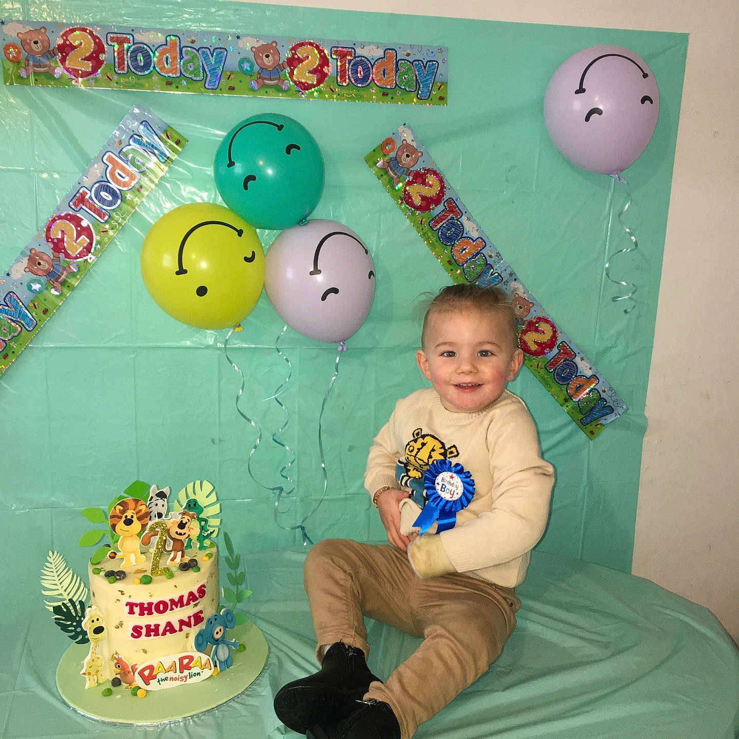 Thomas Shane is registered to the contest to win money with this photo: balloon, birthdaycake, boy, cake, child, clothing, cream, dessert, face, food, footwear, fun, head, icing, male, party, people, person, shoe, sweets