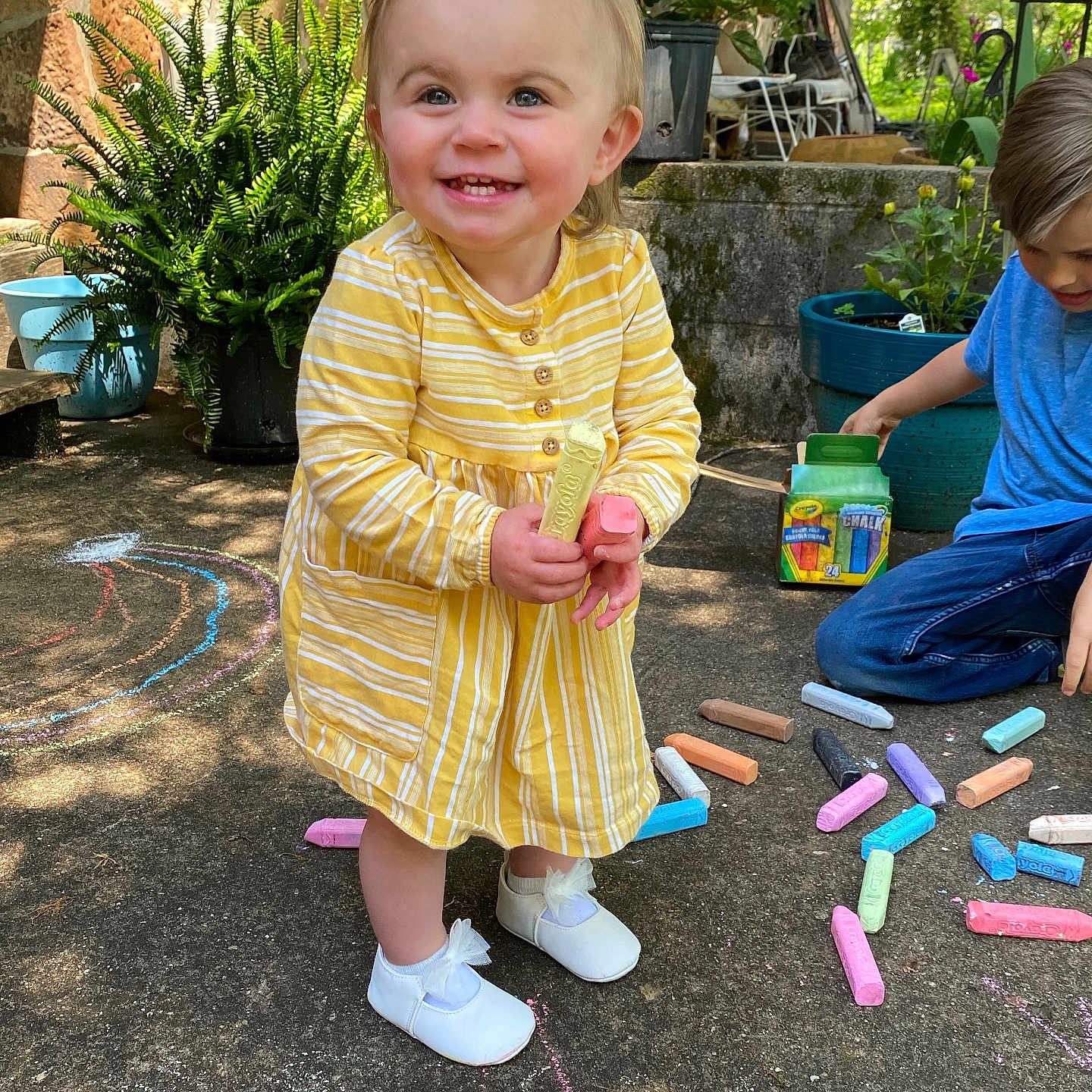 Kendall is registered to the contest to win money with this photo: city, clothing, face, footwear, head, herbal, herbs, jar, person, photography, plant, planter, portrait, pottedplant, pottery, road, shoe, street, urban, vase