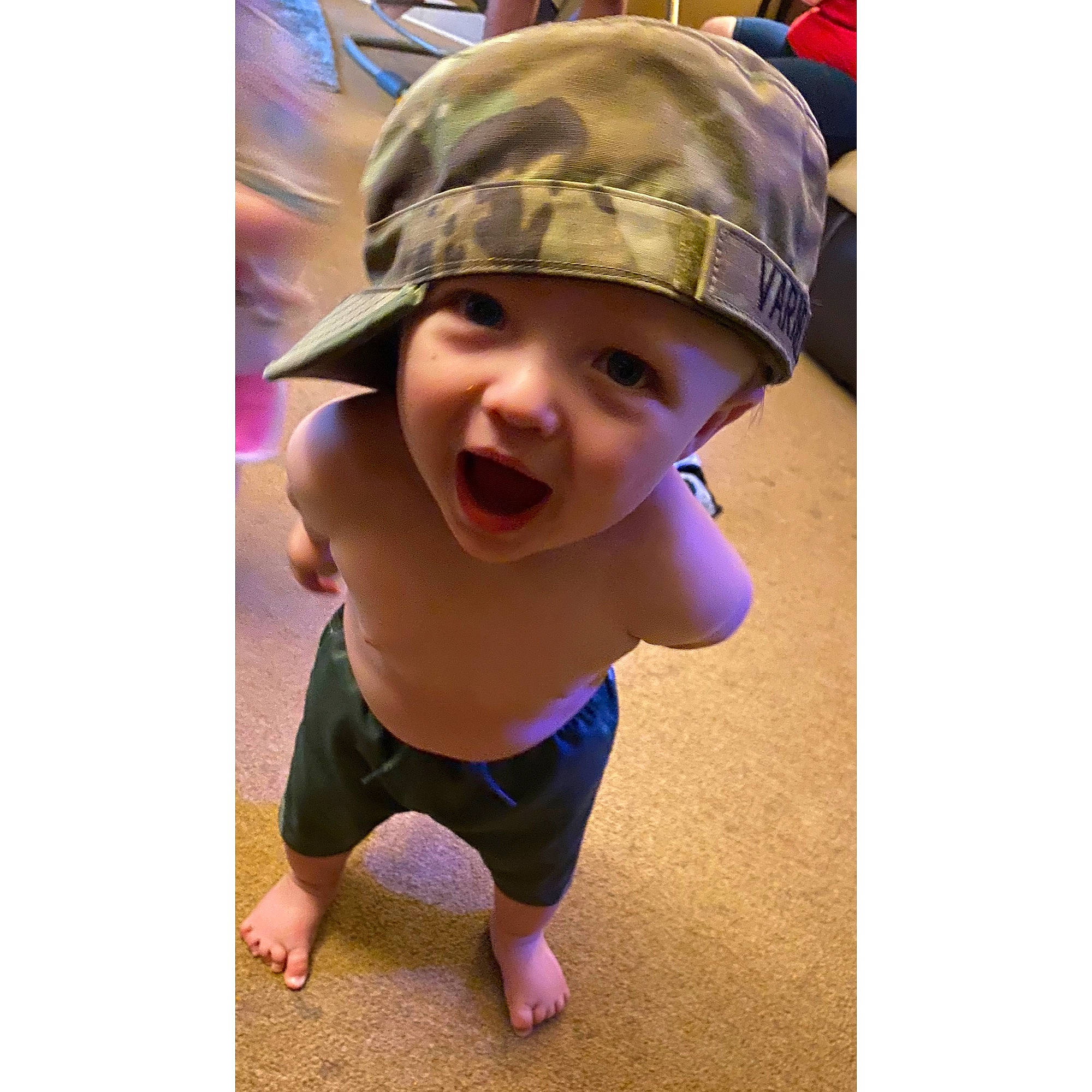Gunner joined the competition — help win amazing prizes! baby_toddler_clothing, baseball_cap, cap, child, clothing, electric_blue, fashion_accessory, hair_accessory, happy, headgear, headwear, helmet, magenta, neck, pattern, person, personal_protective_equipment, purple, sleeve, smile