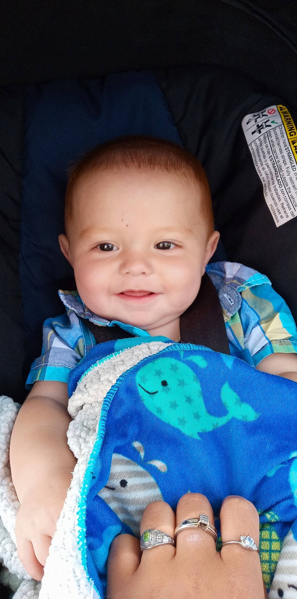 D'Angelo is registered to the contest to win money with this photo: arm, azure, baby, baby_toddler_clothing, blue, cheek, chin, cool, eye, facial_expression, finger, hairstyle, happy, iris, joy, mouth, nose, person, skin, sleeve