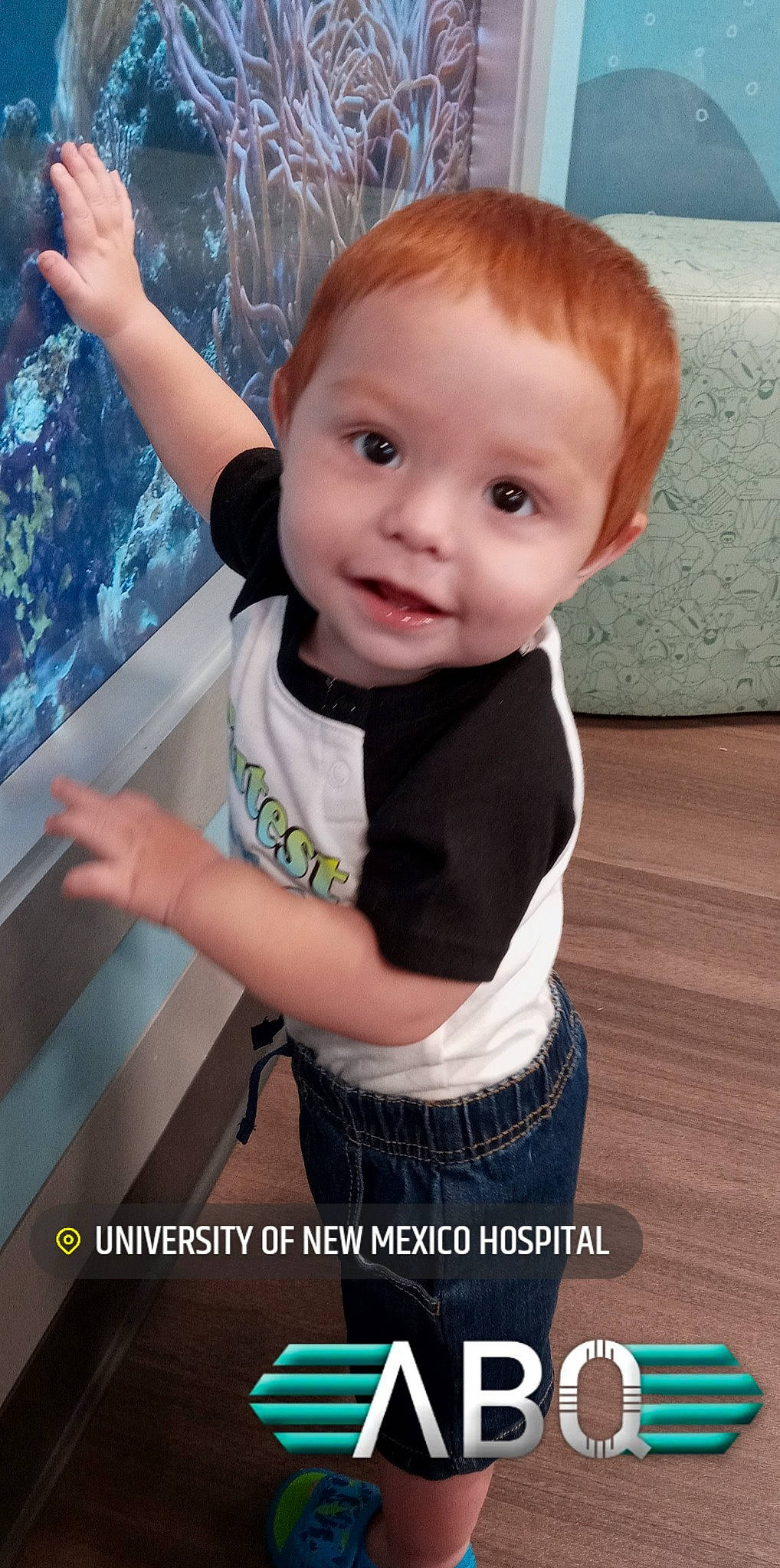 D'Angelo joined the competition — help win amazing prizes! baby, baby_toddler_clothing, cheek, child, cool, finger, flash_photography, flooring, fun, happy, human_body, pattern, person, photo_caption, play, sleeve, smile, standing, t_shirt, thumb