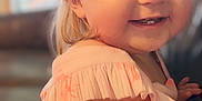 Elliana is registered to the contest to win money with this photo: toddler, child, smiling, happy, blonde_hair, pink_dress, indoor, portrait, closeup, cute, baby, face, cheeks, ruffles, person, young_child, candid, soft_light, background_blur, playful