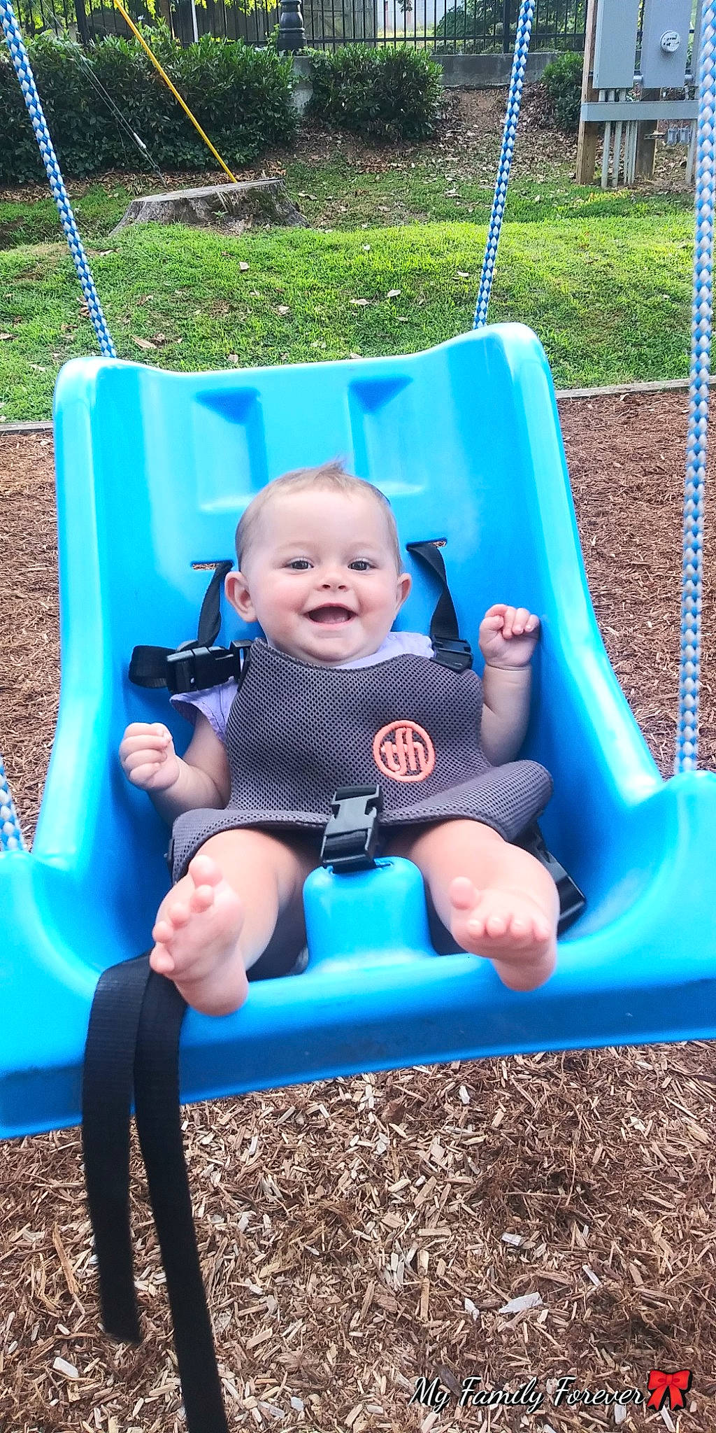 Kc  joined the competition — help win amazing prizes! baby, child, fun, grass, leisure, outdoor_play_equipment, person, play, playground, public_space, recreation, smile, summer, swing, toddler, vacation