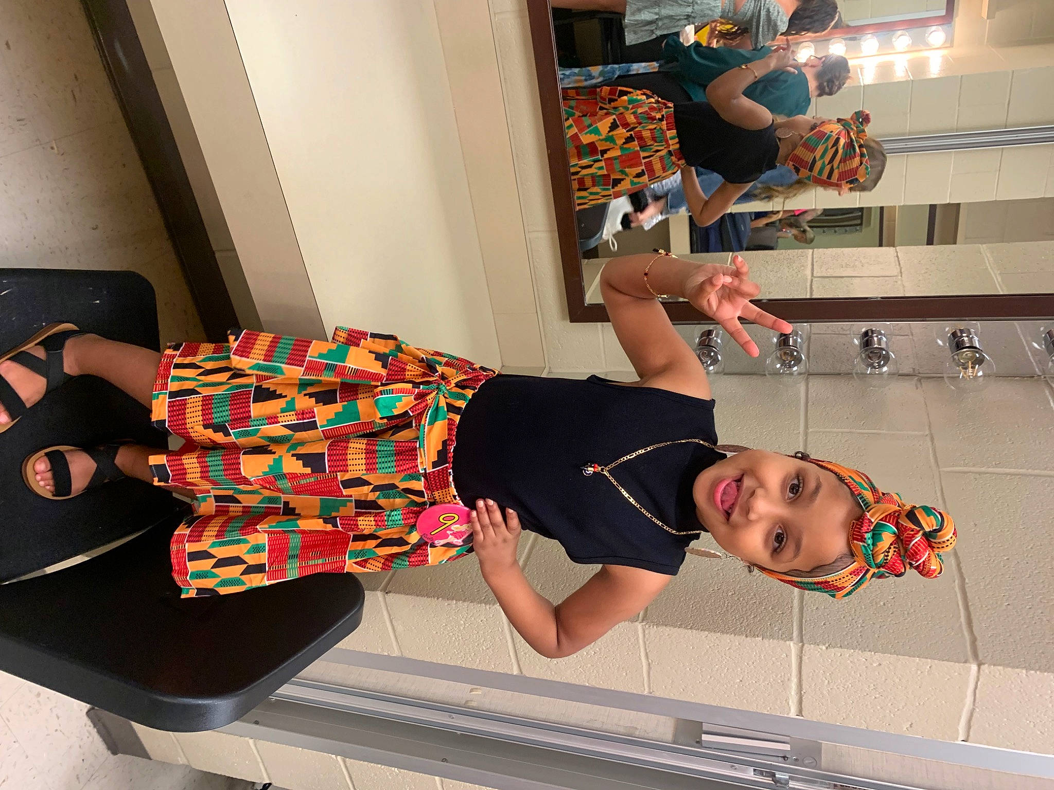 Jernie is registered to the contest to win money with this photo: calf, child, elbow, flooring, fun, headwear, human_leg, joint, joy, knee, leisure, person, room, sandal, sportswear, standing, thigh, toddler, waist, wrist