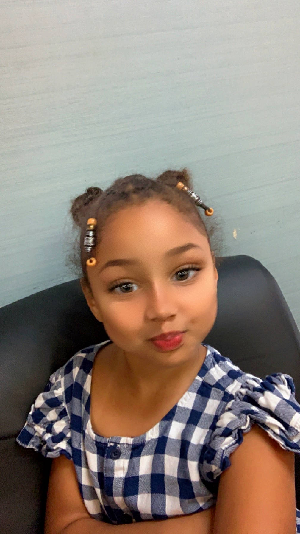 Jernie is registered to the contest to win money with this photo: black_hair, brown_hair, bun, cheek, design, eyelash, fashion_design, flash_photography, forehead, fun, hairstyle, happy, joy, lip, long_hair, makeover, pattern, person, plaid, sitting