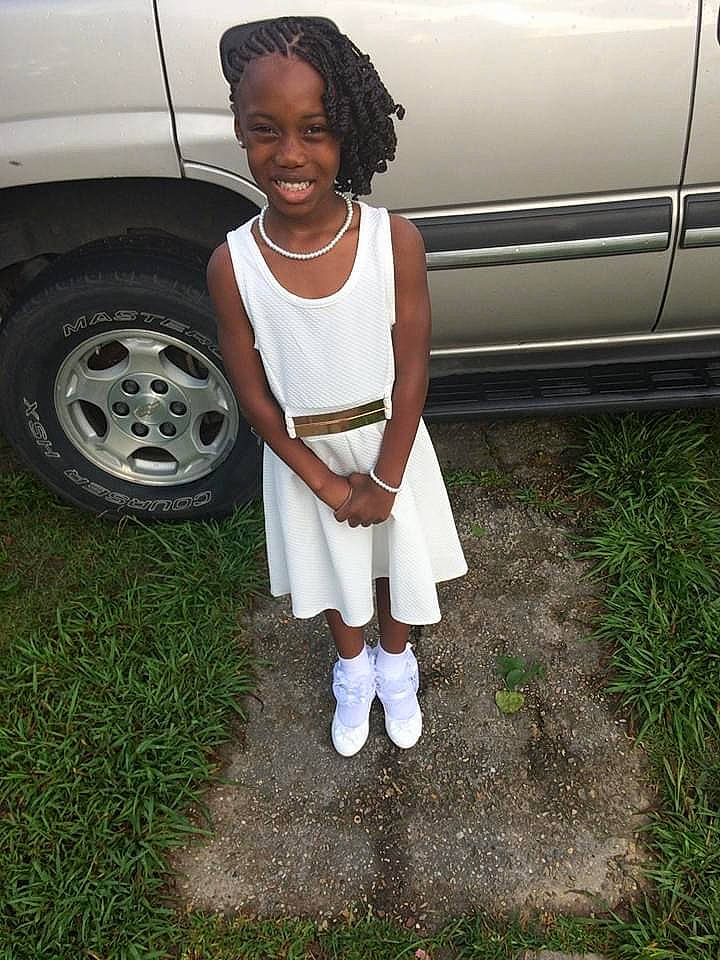 Arnayshia joined the competition — help win amazing prizes! alloy_wheel, automotive_design, automotive_exterior, automotive_lighting, automotive_tire, car, clothing, dress, grass, joy, land_vehicle, leg, light, mammal, mode_of_transport, motor_vehicle, person, smile, tire, vehicle