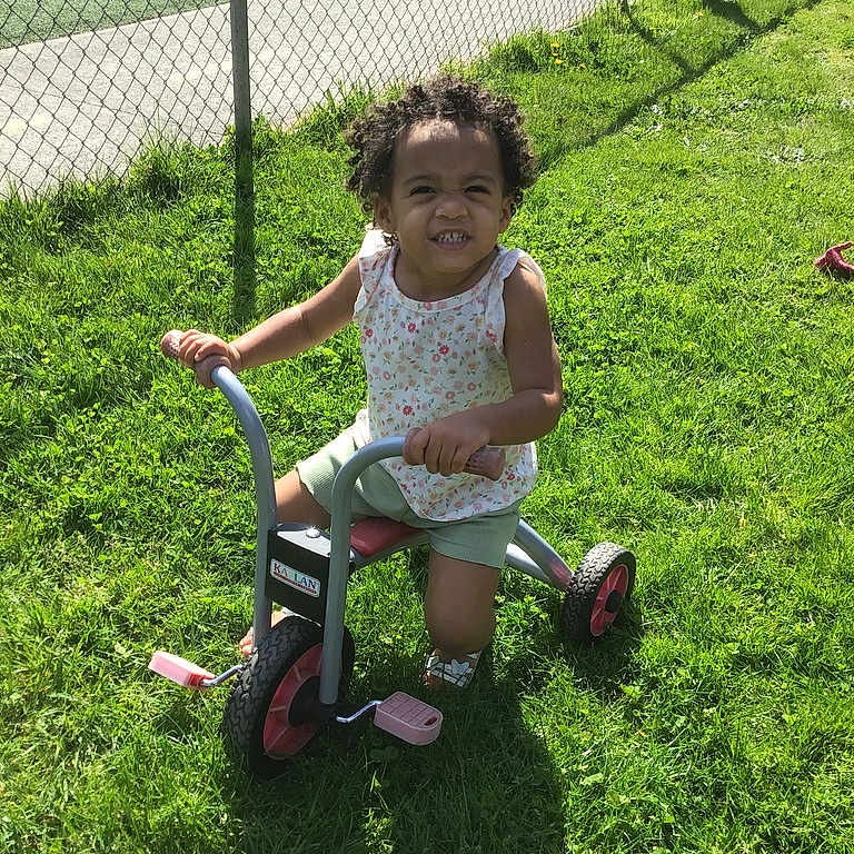 Kyleigh is registered to the contest to win money with this photo: backyard, child, face, female, field, girl, grass, head, lawn, machine, nature, outdoors, park, person, photography, plant, portrait, summer, wheel, yard