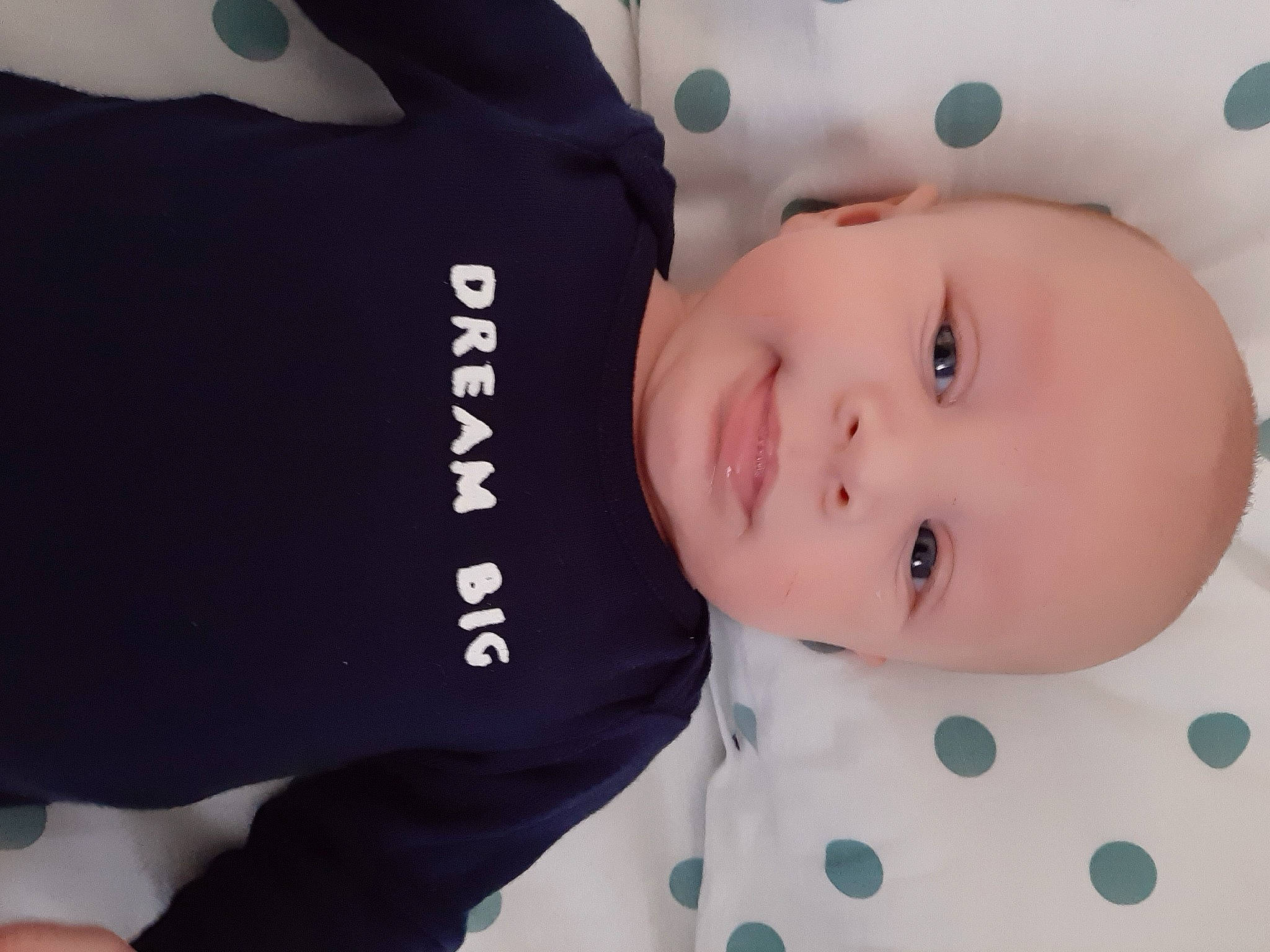 Pierre participe au concours pour gagner de l'argent avec cette photo : active_shirt, baby, baby_products, baby_toddler_clothing, cheek, iris, person, polka_dot, skin, sleeve, toddler