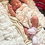 baby, newborn, infant, sleeping, blanket, socks, soft, cozy, resting, cute, child, person, indoors, warm, comfort, fabric, texture, skin, small, peaceful